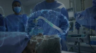 Yoğun bakımda havalandırmayı ayarlayan tıbbi ekip holografik beyin taraması ile yönlendirme prosedürü uyguluyor. Sağlık, yenilik, cerrahi, tanı, yoğun bakım, teknoloji, takım çalışması