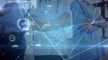 Klinikte duran tıbbi ekip, parlayan ağ çizgileri ve veri grafikleriyle stetoskopları sergiliyor. Sağlık, işbirliği, yenilik, teknoloji, profesyonellik, tanı, takım çalışması