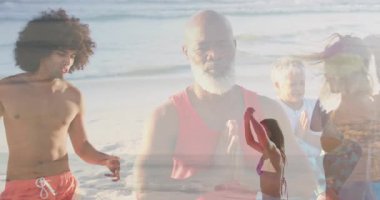 Kumsalda dans eden bir kadın, dalgalarla yoga yapan bir grup, canlandırılmış sağlık ikonlarıyla. Dans, spor, rahatlama, uyum, canlılık, açık hava, farkındalık.