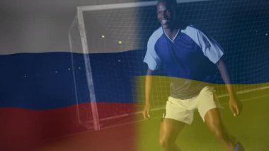 Futbolcu gece gol ağıyla eğiliyor, animasyon bayrak çizgileriyle teknoloji sergiliyor. Atletik, zafer, kararlılık, yoğunluk, canlı, enerjik, spor