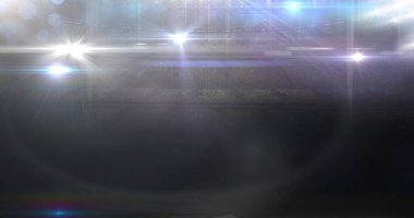 Siyah arka planda ışık noktaları ve stadyum görüntüsü. Sosyal medya ve iletişim arayüzü kavramı dijital olarak oluşturulmuş görüntü.