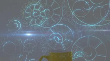 Havada süzülen neon dişliler sarı kahve fincanının etrafında dönerek 3 boyutlu görüntüler oluşturuyor. Fütürist, soyut, teknoloji, yenilik, dijital sanat, canlı, endüstriyel