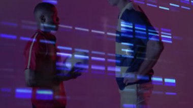 Stüdyoda spor analitiği için spor topu üzerinde dijital kod çizgileri sergileyen adamlar. Hareket, takım çalışması, teknoloji, yenilik, atletizm, rekabet, dijital