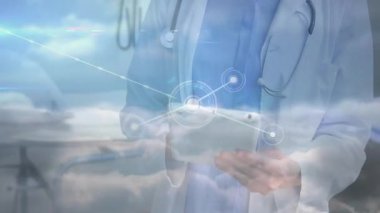 Doktor verileri inceliyor, klinik içleri holografik tıbbi düğümlerin parlayan ağıyla harmanlıyor. Tıbbi, teknoloji, fütüristik, veri, sağlık, yenilik, dijital