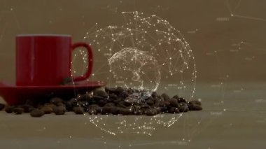 Kırmızı seramik kahve fincanı, kavrulmuş fasulye ve sayısal kodları gösteren kablo kürelerinin arasında duruyor. Kahve, teknoloji, yenilik, modern, dijital, soyut, tasarım