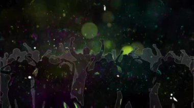Siluetler renkli bokeh ışıkları ve konfetiyle canlı soyut arkaplanda ilerliyorlar. Kalabalık, enerji, kutlama, gece hayatı, ritim, hareket, canlı