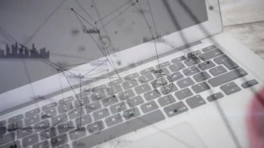 Dizüstü bilgisayarın klavyesi düz dizayn ağının altında duruyor, kırmızı kupanın yanında veri grafikleri gösteriliyor. Teknoloji, yenilik, çalışma alanı, dijital, bağlantı, modern, gelecekçi