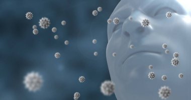 Covid-19 cells floating over human head model against blue background. medical research and science technology concept
