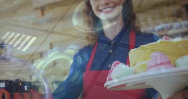 Kafede hamur işi hazırlayan kadın, animasyon veri panelleri ve pasta ayrıntıları sergiliyor. Fırın, kafe, pasta, dijital arayüz, veri görselleştirme, konukseverlik, aşçılık