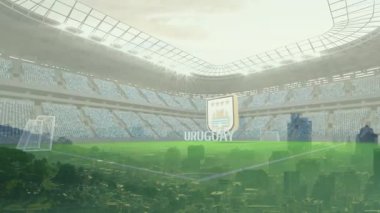 Uruguay arması ve yarı şeffaf URUGUAY metni modern stadyumdaki canlı yeşil perdenin üzerinde yansıtılıyor. Stadyum, izleyiciler, mimari, spor, kutlama, takım çalışması, modern