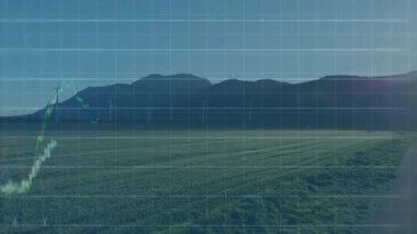 Finansal örtüler tarım arazisi üzerinde, rüzgar türbinleri ve şamdan çizelgelerini gösteriyor. Sürdürülebilir, yenilenebilir, tarım, teknoloji, yatırım, çevre dostu, kırsal