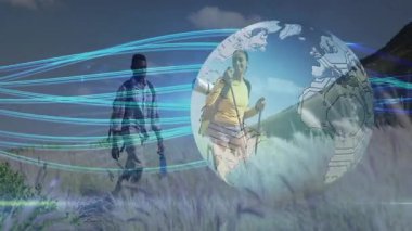 İki yürüyüşçü, teknolojiyi temsil eden dünyanın dört bir yanında parlayan veri akışları ile çayırlarda dolaşır. Macera, keşif, teknoloji, bağlantı, açık hava, işbirliği, yenilik