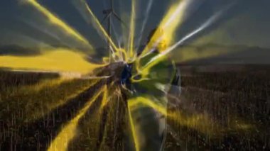 Yelek giyen mühendis, yeşil enerji dalgalı akıllı telefon kullanarak rüzgar türbini izliyor. Güvenlik, teknoloji, yenilenebilir, endüstri, çevre, yenilik, kırsal