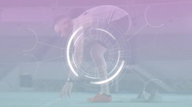 Erkek sporcu spor teknolojisiyle bloklardan fırlatılıyor. Hız göstergesiyle ukalalık yapıyor. Performans, dayanıklılık, rekabet, atletizm, hareket, açık hava, minimalist