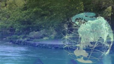 Göl manzarası üzerinde süzülen tel çerçeveli küre, yeşillikleri yansıtan su ve yükselen oklar. Coğrafya, doğa, çevre, teknoloji, sürdürülebilirlik, yenilik, sükunet