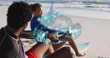 Kıyı şeridindeki sörf tahtalarında oturan erkek ve kadın sörfçüler stilize teknoloji sıçramaları sergiliyorlar. Macera, açık hava, coşku, dostluk, eğlence, dinamik, kıyı