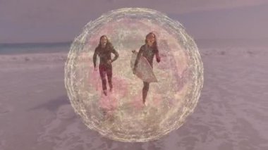 Sahilde sığ sörf yapan iki sörfçü, teknoloji için küresel ağ örtüsü sergiliyor. Macera, arkadaşlık, canlılık, kıyı şeridi, bağlantı, spor, gençlik