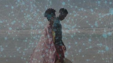 Adam kumsalda kadın sırtında taşıyordu. Parlak ağ düğümleri teknoloji temasını gösteriyordu. Romantik, dostluk, canlılık, esneklik, kutlama, bağlantı, canlı