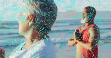 Sahilde kadın partnerle dua eden erkek, canlanmış dalga ikonlarını iyi göstermek için poz veriyor. Dinginlik, farkındalık, rahatlama, sahil, açık hava, ahenk, dalgınlık