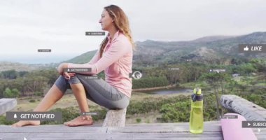 Kadın vadiye tepeden bakan, yüzen sosyal medya ikonları pazarlama ölçülerini yükseltiyor. Manzara, tefekkür, dijital, bağlantı, sağlık, çevre, açık hava