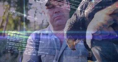 Şahin besleyen erkek şahin açık havada finans çizelgeleri ve borsa kalbi sergiliyor. Kuş, vahşi yaşam, teknoloji, veri görselleştirme, doğa, macera, profesyonel