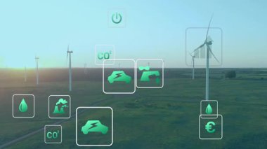 Büyük beyaz rüzgar türbini temiz enerji üretirken yeşil karbondioksit ikonları çimen ovasının üzerinde yüzüyor. Yenilenebilir, sürdürülebilirlik, çevre dostu, yeşil enerji, çevre, koruma, manzara
