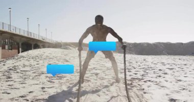 Adam plaj fitness antrenmanı yapıyor. Animasyon kalp atış hızı grafiği ve ip hareket simgeleri gösteriyor. Güç, dayanıklılık, çeviklik, açık hava, aktif, canlılık, motivasyon