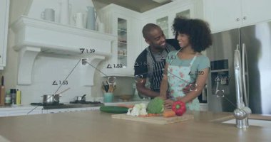 Modern mutfakta sebze hazırlayan, yemek ikonları ve çizelgeler hazırlayan bir çift. Aşçılık, aşçılık, samimiyet, ortaklık, modern tasarım, yaşam tarzı, ev hazırlığı