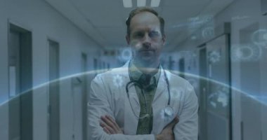 Doktor hastane koridorunda duruyor, holografik tıbbi çizelgeler ve parlayan dünya ile etkileşimde. Tıbbi, teknoloji, yenilik, sağlık hizmetleri, fütüristik, analiz, profesyonel