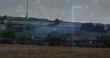 Rüzgâr türbini fütüristik verileri düz tasarımla yuvarlanan tarım arazilerine yansıtıyor. Yenilenebilir, sürdürülebilirlik, teknoloji, manzara, yenilik, dijital, çevre dostu