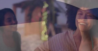 Pazarlama ekibi sahilde yaz kampanyası için animasyon güneş ikonu ve performans grafiğiyle beyin fırtınası yapıyor. Sahil, eğlence, arkadaşlık, açık hava, yaşam tarzı, canlı, gün batımı.