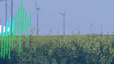 Sarı ekin tarlaları ve rüzgar türbinleri üzerinde renkli çubuklar ve trend çizgileri içeren verilerin görselleştirilmesi. Kırsal, yenilenebilir, manzara, teknoloji, sürdürülebilirlik, eko, grafikler