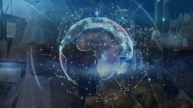 Pastane çalışanı önlük giyip dizüstü bilgisayar kullanıyor. Hologram teknolojisini kullanarak sayısal verileri gösteriyor. Dijital, yenilik, modern, bağlantı, aşçılık, verimlilik, fütüristik