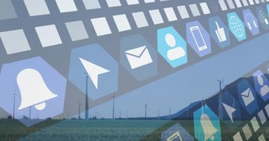 Çimenli düzlüklerde yüzen dijital simgelerin yer aldığı bir dizi rüzgar türbini canlandırılıyor. Yenilenebilir enerji, sürdürülebilirlik, teknoloji, fütüristik, çevre dostu, dijital yenilik, çevre