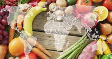 Masada yatan meyve ve sebzelerin üzerindeki dünya haritası. Gıda, meyve, sebze ve dünya vegan günü konsepti dijital olarak oluşturulmuş görüntü.