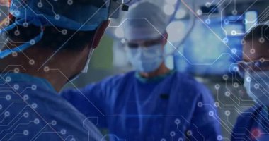 Ameliyat önlüğü ve maskeli tıbbi ekip ameliyathanede işbirliği yapıyor. Devreleri kılavuz ameliyatla birleştiriyor. Sağlık, takım çalışması, yenilik, teknoloji, profesyonellik, hassasiyet, teşhis