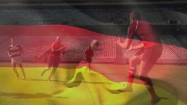Rugby oyuncuları stadyumdaki spor sahasında top taşıyıcıya çelme takıp animasyon veri ölçümleri sergiliyorlar. Sporcular, takım çalışması, rekabet, güç, açık hava, dinamik, spor