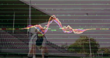 Stadyumda voleybol oynayan bayan sporcu spor analitiğini ızgara ve kıvrımlarla örtüşüyor. Sporcu, spor, performans, teknoloji, analitik, rekabet, eğitim