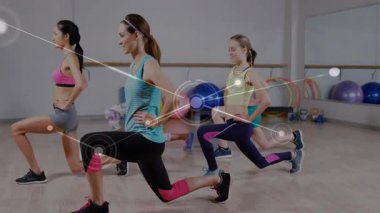 Beden eğitimi stüdyosunda hareketler yapan beş kadından oluşan bir grup, hareketli düğümler ve çizgiler eşliğinde. Spor, spor, spor, güç, eğitim, hareket, sağlık