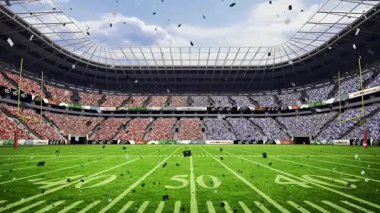 Amerikan futbol sahasında 3 boyutlu yüzen konfetiyle birlikte sarı kale direkleri sergileniyor. Stadyum, kutlama, dinamik, açık hava, enerjik, sportif, canlı