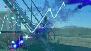 Rüzgâr çiftliğindeki metal merdivenlere tırmanan teknisyen verileri grafik ve haritalarla örtüyor. Endüstriyel, yenilenebilir, teknoloji, mühendislik, geleceksel, güvenlik, çevre