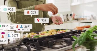 Mutfakta sebze baharatı veren bir kadın, yemek pişirme alanında yüzen yiyecek pazarlama ikonları. Aşçılık, aşçılık, gastronomi, modern, canlı, sağlıklı, yaşam tarzı