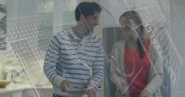 Brokoli doğrayan bir adam ve mutfak tezgahında domates doğrayan bir kadın teknolojik verileri üst üste koyuyor. Aşçılık, aşçılık, yerli, yaşam tarzı, modern, sağlıklı, işbirliği