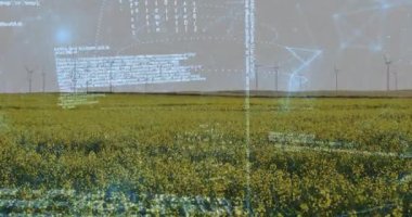 Sarı çiçekli alan ufka kadar uzanıyor, kod metni havada yüzüyor, türbinler yavaşça dönüyor. Tarım, yenilenebilir, dijital, sürdürülebilir, modern, manzaralı, yenilikçi