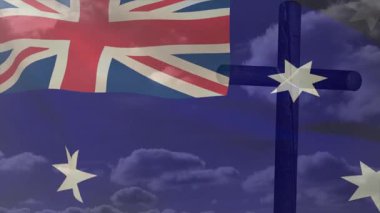 Rüzgâr bayrağın dalgalanmasına ve kolların çapraz dönmesine neden oluyor. Vatanseverlik, sembolizm, miras, bağlılık, dindarlık, dinginlik, hareket