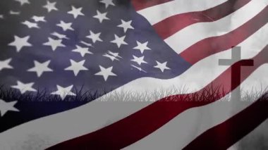 Hafif bir esinti çim silueti üzerinde dalgalanan bayrağı ve anıt arka planda çapraz dalgalanmayı başlatıyor. Vatanseverlik, ulusal, törensel, miras, resmi, haraç, sembolizm