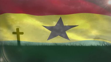 Anma alanının üzerinden esen rüzgar, Gana bayrağının güneş ışığını yakalarken anısına dalgalanmasına neden oluyor. Vatanseverlik, haraç, huzur, sembolizm, manzara, kutlama, saygı