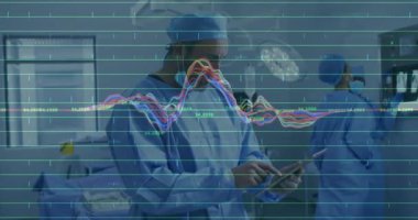 Cerrahın tıbbî ya da hayati organları dengelemek için dalga şeklini düzeltme tableti. Tıbbi, sağlık, teknoloji, analiz, takım çalışması, hassasiyet, yenilik