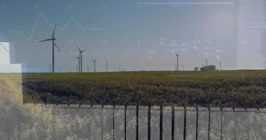 Şebeke belirdiğinde, rüzgar türbinleri dönüyor, çubuklar yükseliyor ve enerji dalgalanmalarını takip ediyor. Yenilenebilir, sürdürülebilirlik, enerji, teknoloji, veri, görselleştirme, çevre