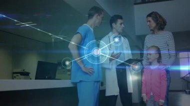 Hastane resepsiyonunda anne ve çocukla sağlık bilgilerini paylaşan bir doktor, ekibin etrafında büyüyen bir ağ. Tıbbi, danışma, sağlık, teknoloji, bağlantı, dijital, iletişim